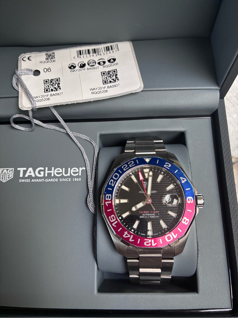 TAG Heuer Stainless Steel GMT Watch with Blue and Red Bezel